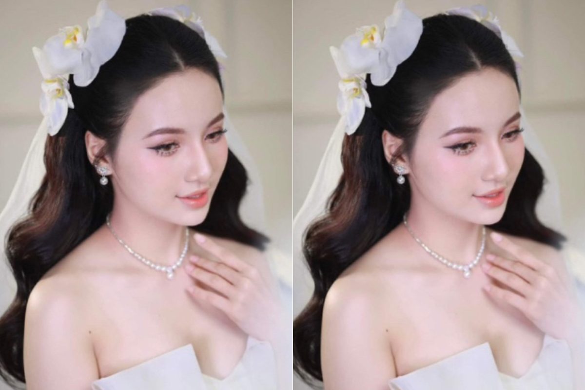 Cô dâu cài hoa lan hồ điệp mini trắng thanh lịch. (Ảnh: Sưu tầm)